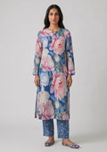 Sapphire Petals by Mirasl, a sapphire blue 2 piece printed lawn co-ord set with pastel floral shirt, matching trouser, and breathable summer lawn fabric.