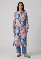 Sapphire Petals by Mirasl, a sapphire blue 2 piece printed lawn co-ord set with pastel floral shirt, matching trouser, and breathable summer lawn fabric.