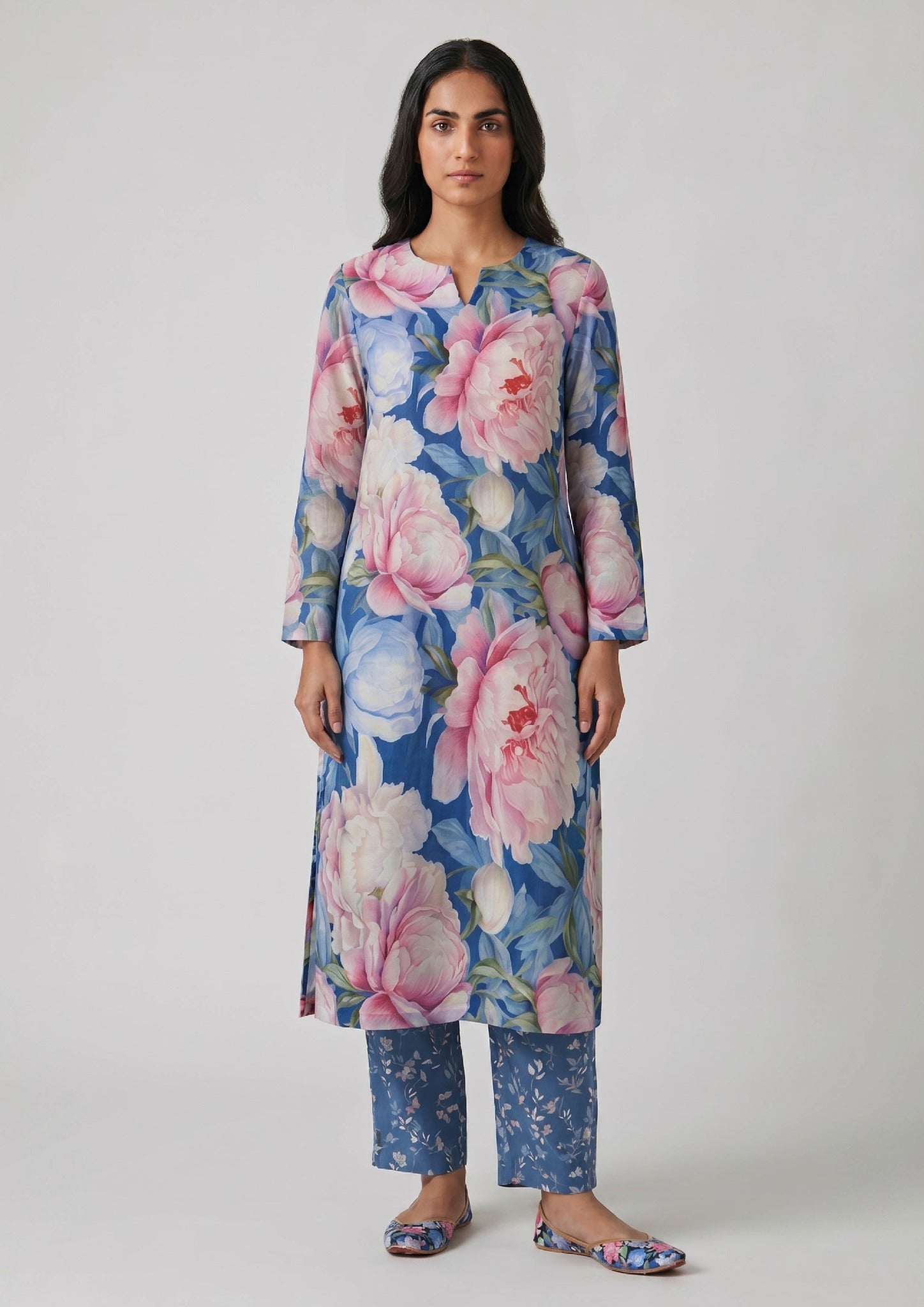 Sapphire Petals by Mirasl, a sapphire blue 2 piece printed lawn co-ord set with pastel floral shirt, matching trouser, and breathable summer lawn fabric.
