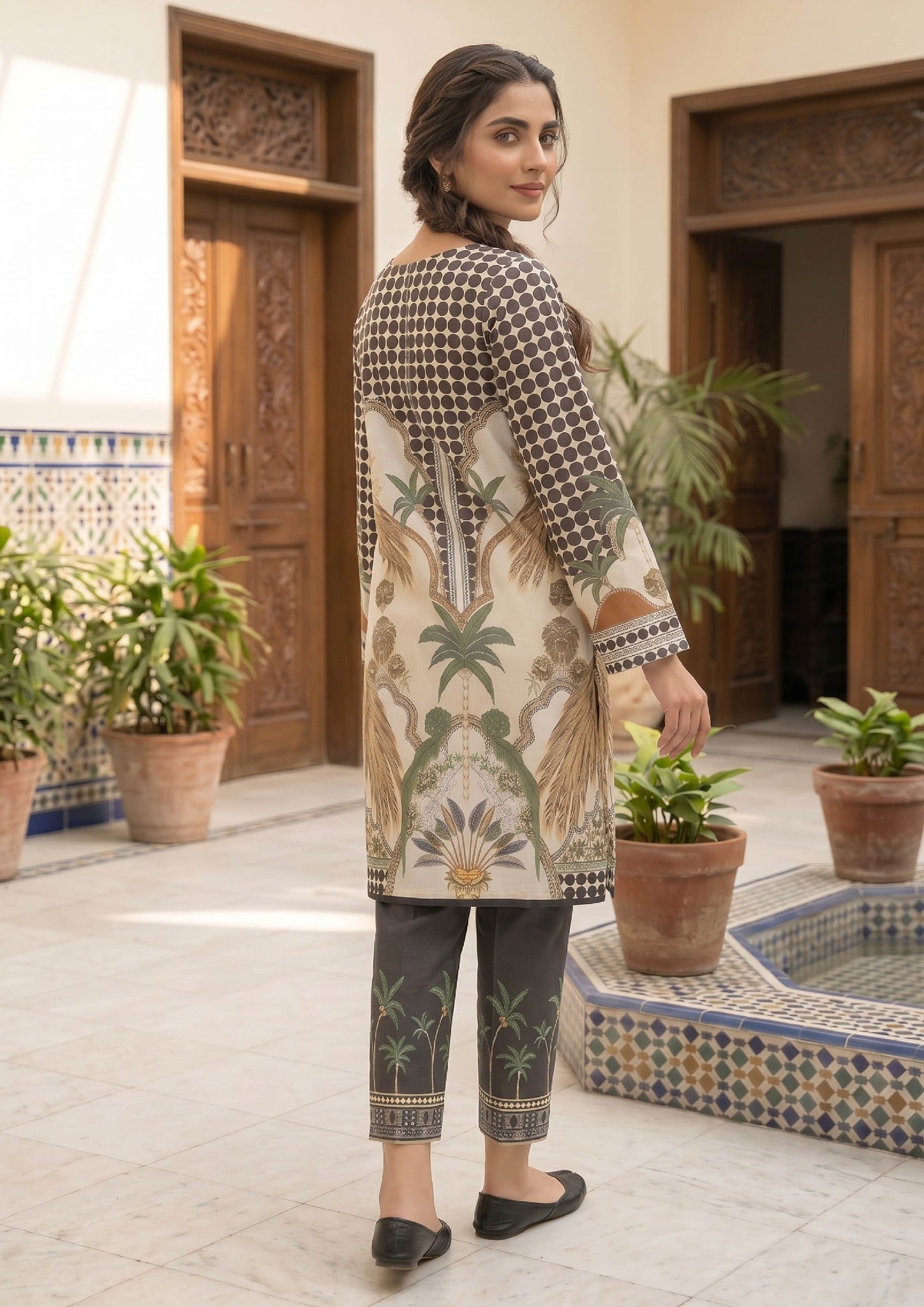 Front view of Sable Tropics 2 piece printed lawn co-ord set by Mirasl featuring an ivory printed shirt, black dotted upper print, full sleeves, and coordinated trouser.