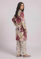 Side view of Ruby Petal printed lawn co-ord set showing the relaxed straight fit, ruby floral print, side slits, and coordinated light floral trouser.