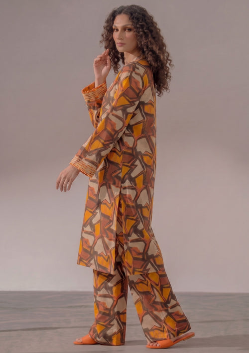 Front view of Retro Rust 2 piece printed lawn co-ord set by Mirasl featuring a knee-down straight shirt, V-style neckline, full sleeves, and wide trouser.