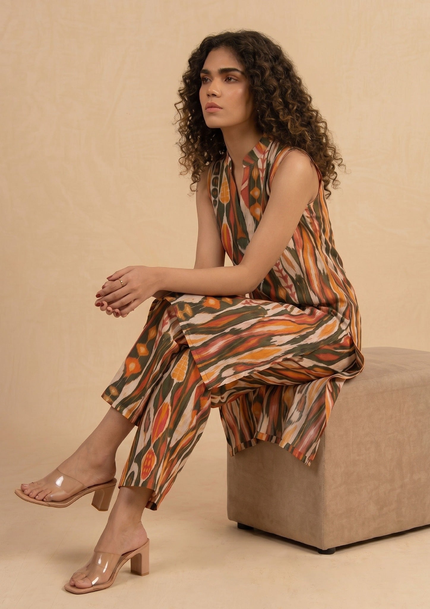 Side view of Linear Illusion printed lawn co-ord set showing the relaxed straight fit, vertical abstract print, side slits, and matching trouser.