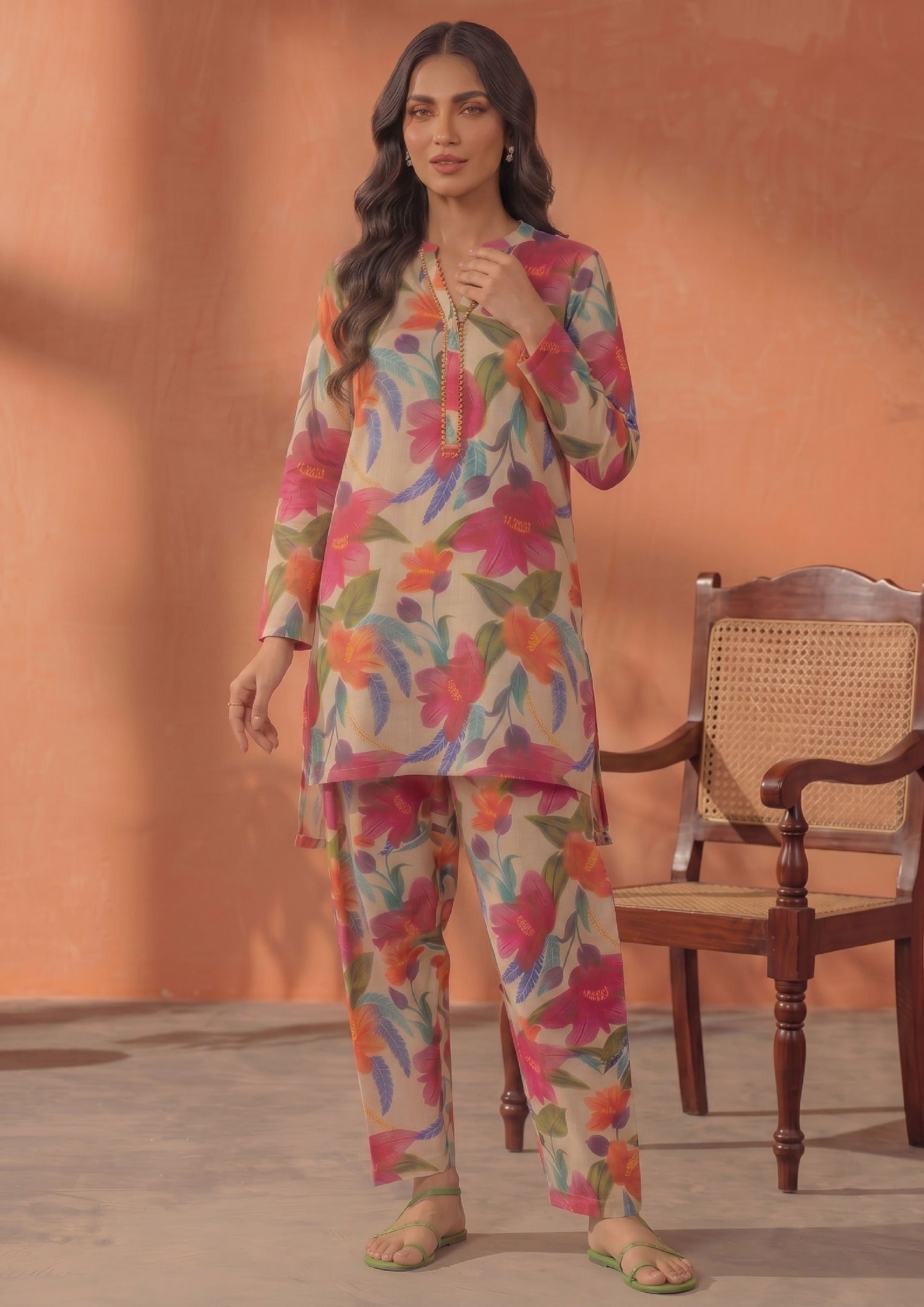 Back view of Ivory Blossom by Mirasl featuring an ivory beige printed lawn shirt with pink, orange, teal, blue, and green floral details.
