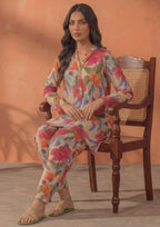 Front view of Ivory Blossom 2 piece printed lawn co-ord set by Mirasl featuring a knee-level floral shirt, V-style neckline, full sleeves, and printed trouser.