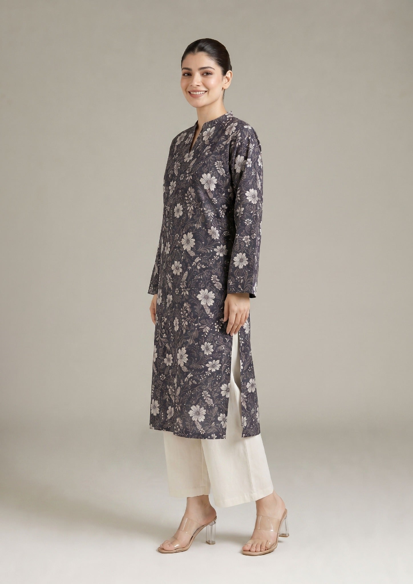 Back view of Evening Meadow by Mirasl featuring a charcoal grey printed lawn shirt with ivory floral motifs, full sleeves, and side slits.