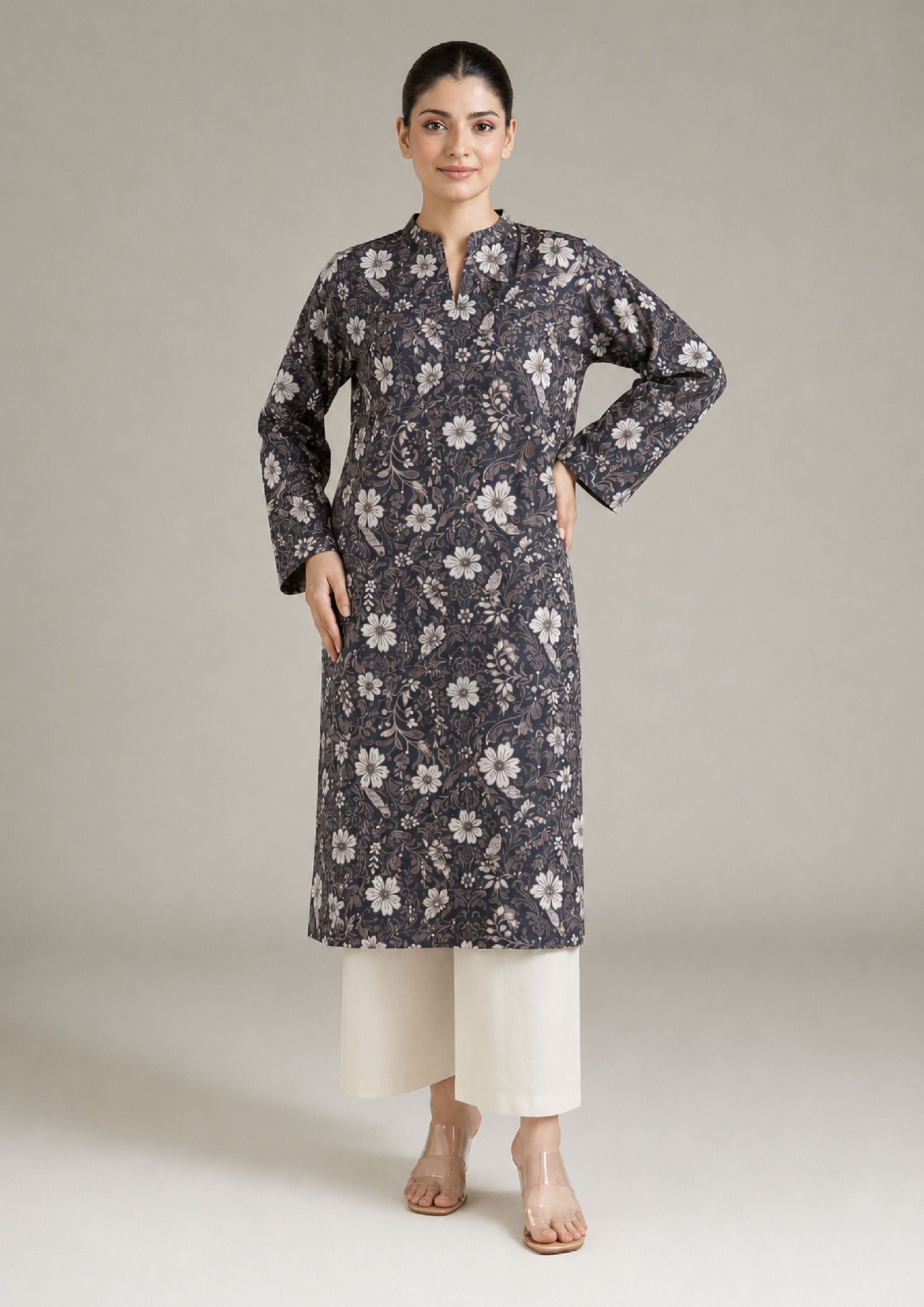 Front view of Evening Meadow 2 piece printed lawn co-ord set by Mirasl featuring a knee-level floral shirt, V-style neckline, full sleeves, and off-white trouser.