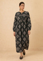 Ebony Crossroad by Mirasl, an ebony black 2 piece printed lawn co-ord set with off-white cross motifs, tassel neckline, relaxed flowy fit, and breathable summer fabric.