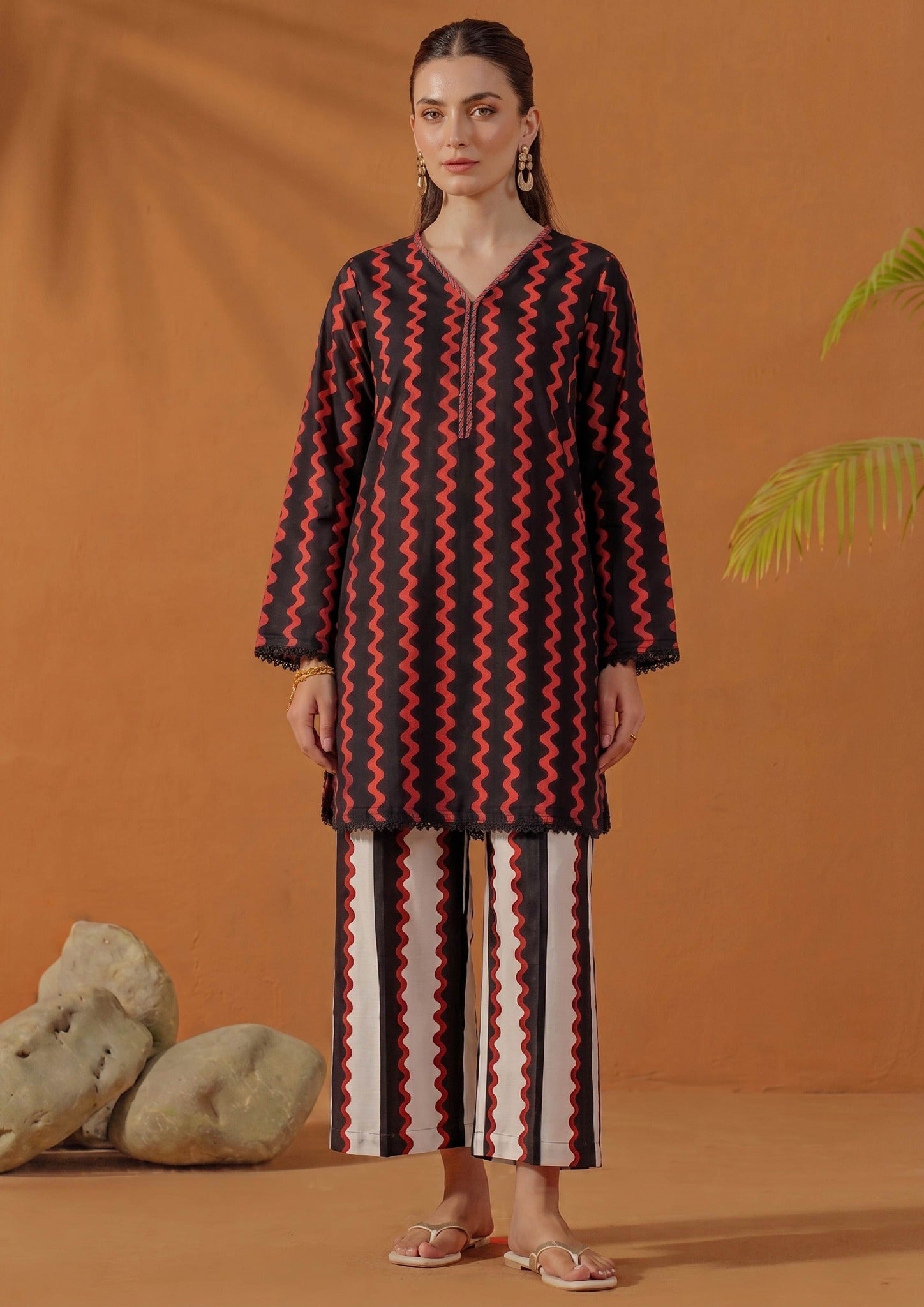 Crimson Ripple by Mirasl, a black and crimson red 2 piece printed lawn co-ord set with ripple motifs, knee-level straight shirt, lace finishing, and breathable summer fabric.