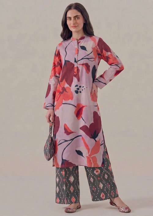 Crimson Ikat by Mirasl, a lilac pink and crimson red 2 piece printed lawn co-ord set with bold floral shirt, ikat printed trouser, straight fit, and breathable summer fabric.