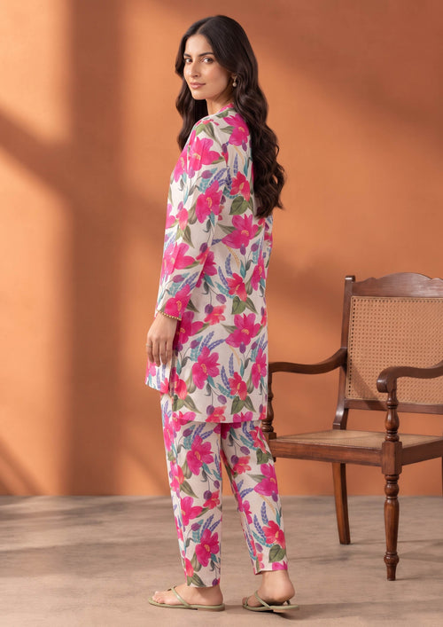 Side view of Ivory Blossom floral lawn suit featuring an ivory shirt and matching pink printed trousers by Mirasl