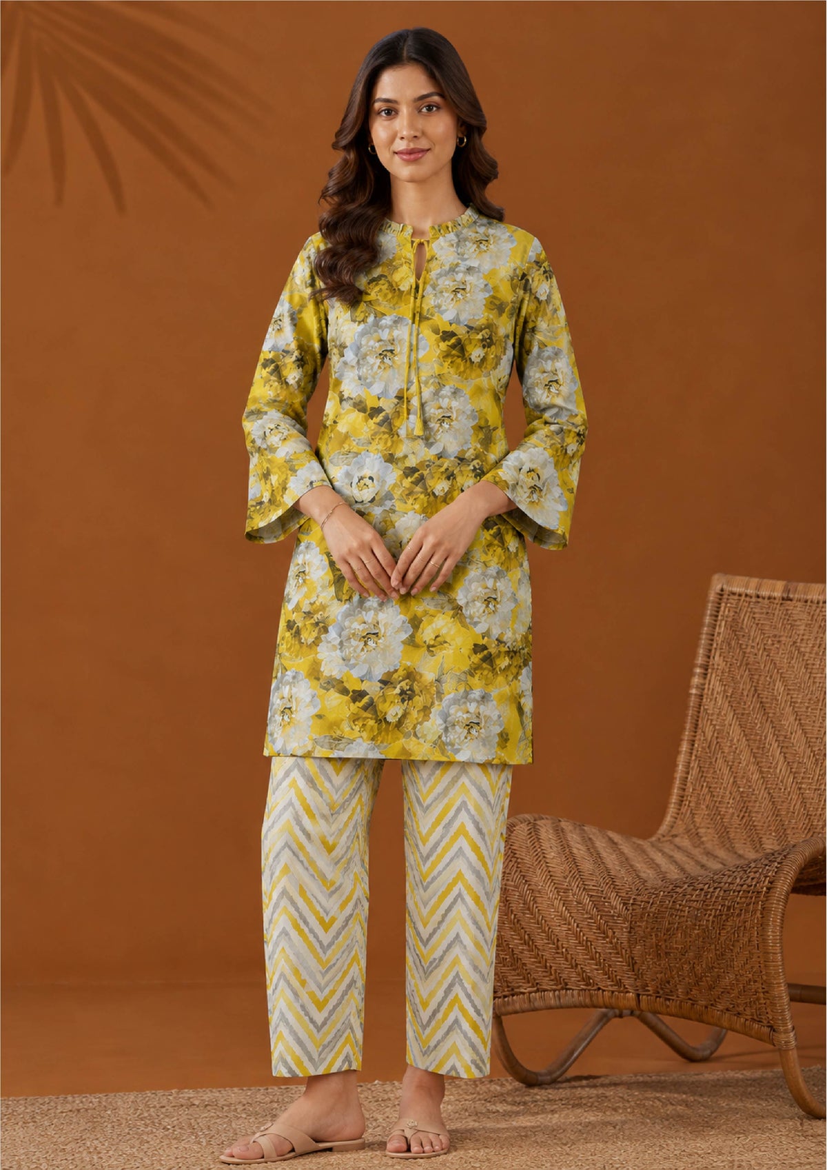 Solenne 2 piece stitched lawn suit with mustard yellow floral shirt and printed chevron trousers, front view by Mirasl