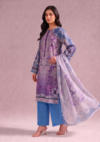 Side view of Amethyst stitched printed lawn suit with blue trouser and floral printed dupatta by Mirasl