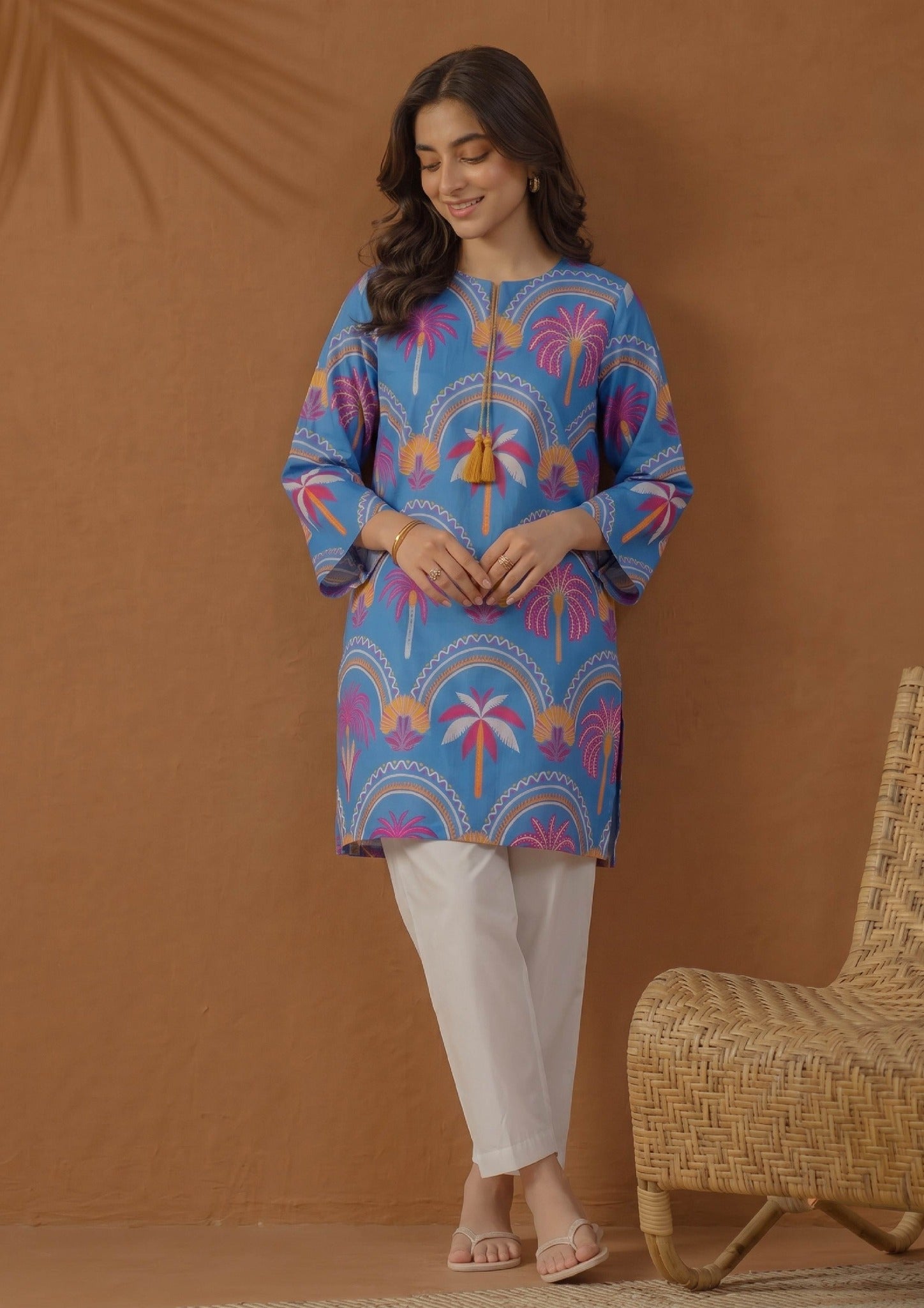 Back close-up view of Mirasl Azure Oasis printed lawn shirt showing blue palm motif pattern and relaxed straight fit.