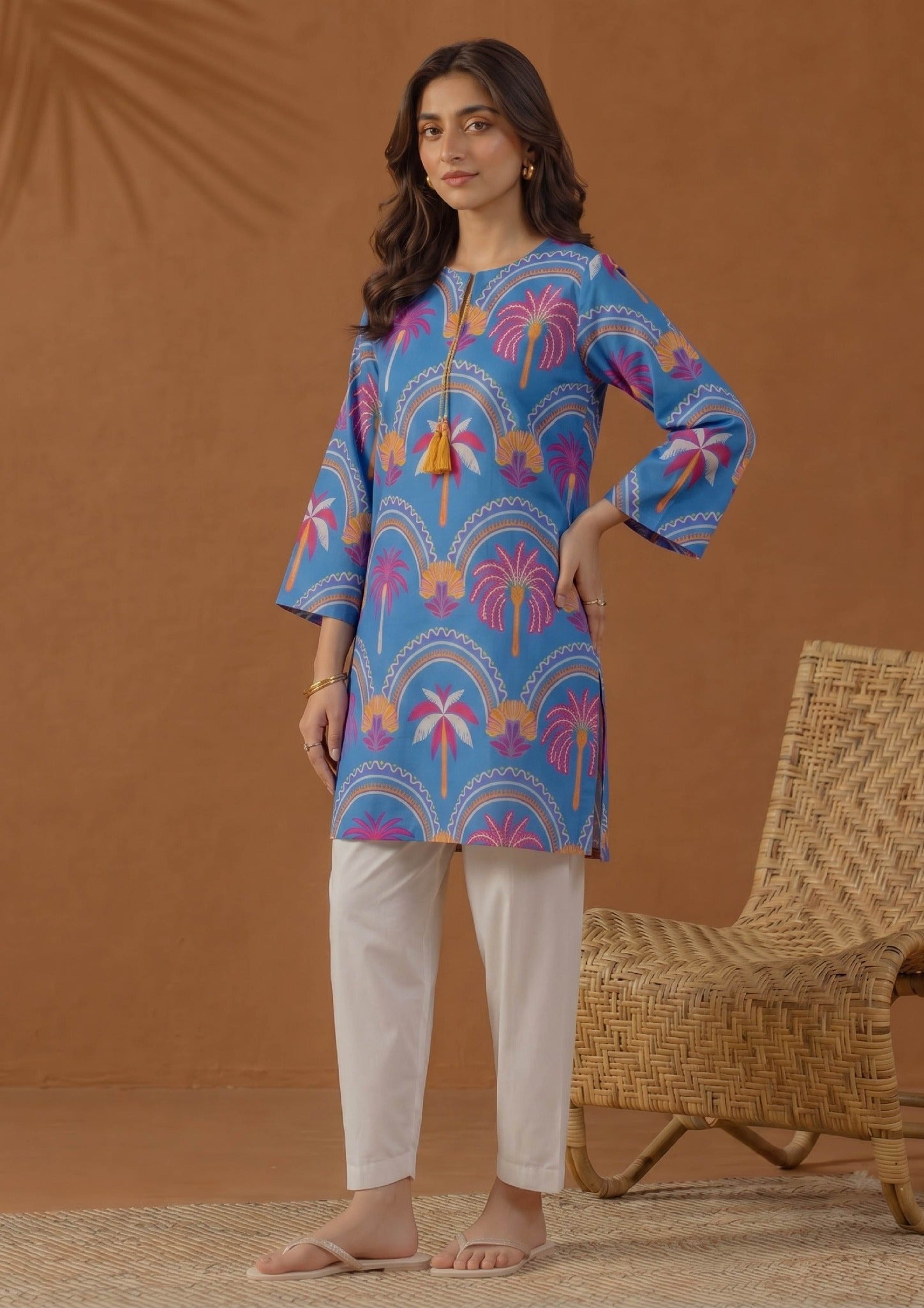 Front view of Mirasl Azure Oasis co-ord set with blue printed shirt and white trouser.