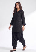 Black Balloon Shalwar by Mirasl in midnight black with relaxed balloon fit and cuffed ankle for modest daily wear