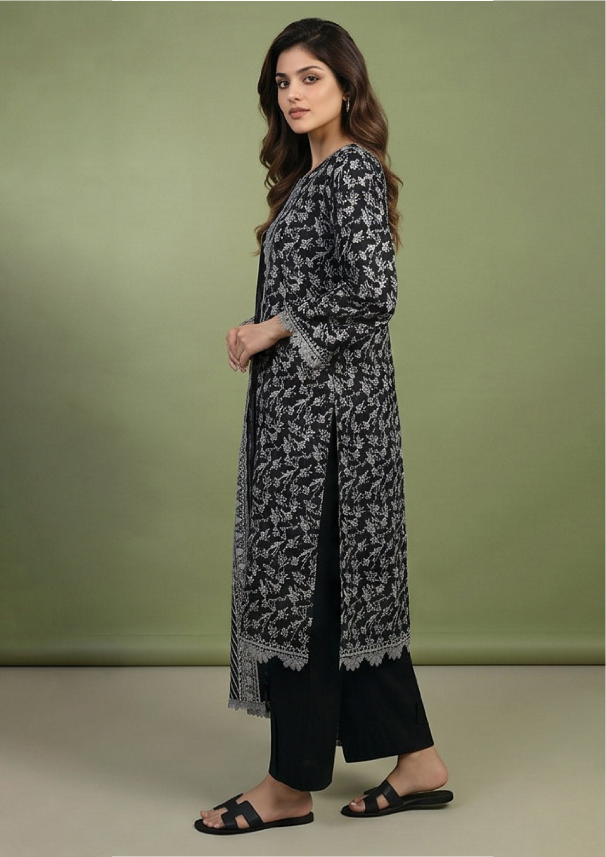 Black printed stitched lawn suit by Mirasl with elegant dupatta border, floral shirt detailing and refined modest Pakistani styling