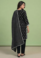 Black stitched lawn suit by Mirasl with chevron print dupatta, straight trouser and elegant everyday Pakistani fashion