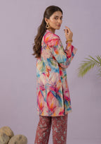 Side-back view of Mirasl Blossom Bramble printed lawn co-ord set showing colorful floral shirt, side slit, and printed trouser.