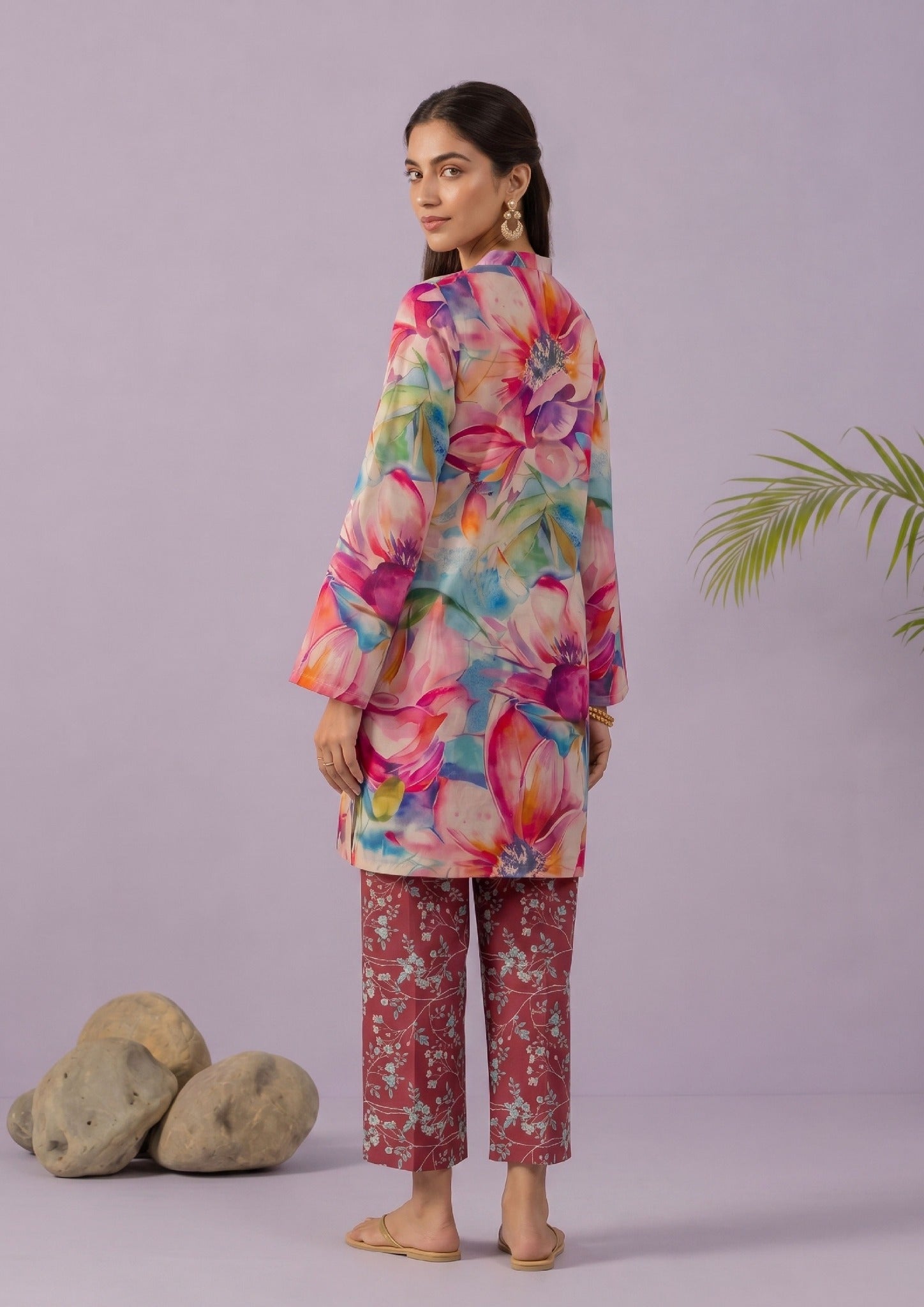 Back view of Mirasl Blossom Bramble ready to wear lawn co-ord set with relaxed straight fit knee-level shirt and rust red printed trouser.