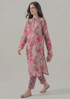 Walking view of Mirasl Blossom Fusion printed lawn co-ord set showing relaxed straight fit shirt, side slits, and printed trouser.