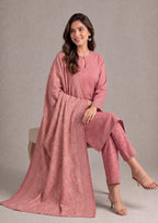 Elegant side styling pose of Blush Ensemble printed lawn suit showcasing the soft blush print, coordinated trouser and flowing printed dupatta by Mirasl.