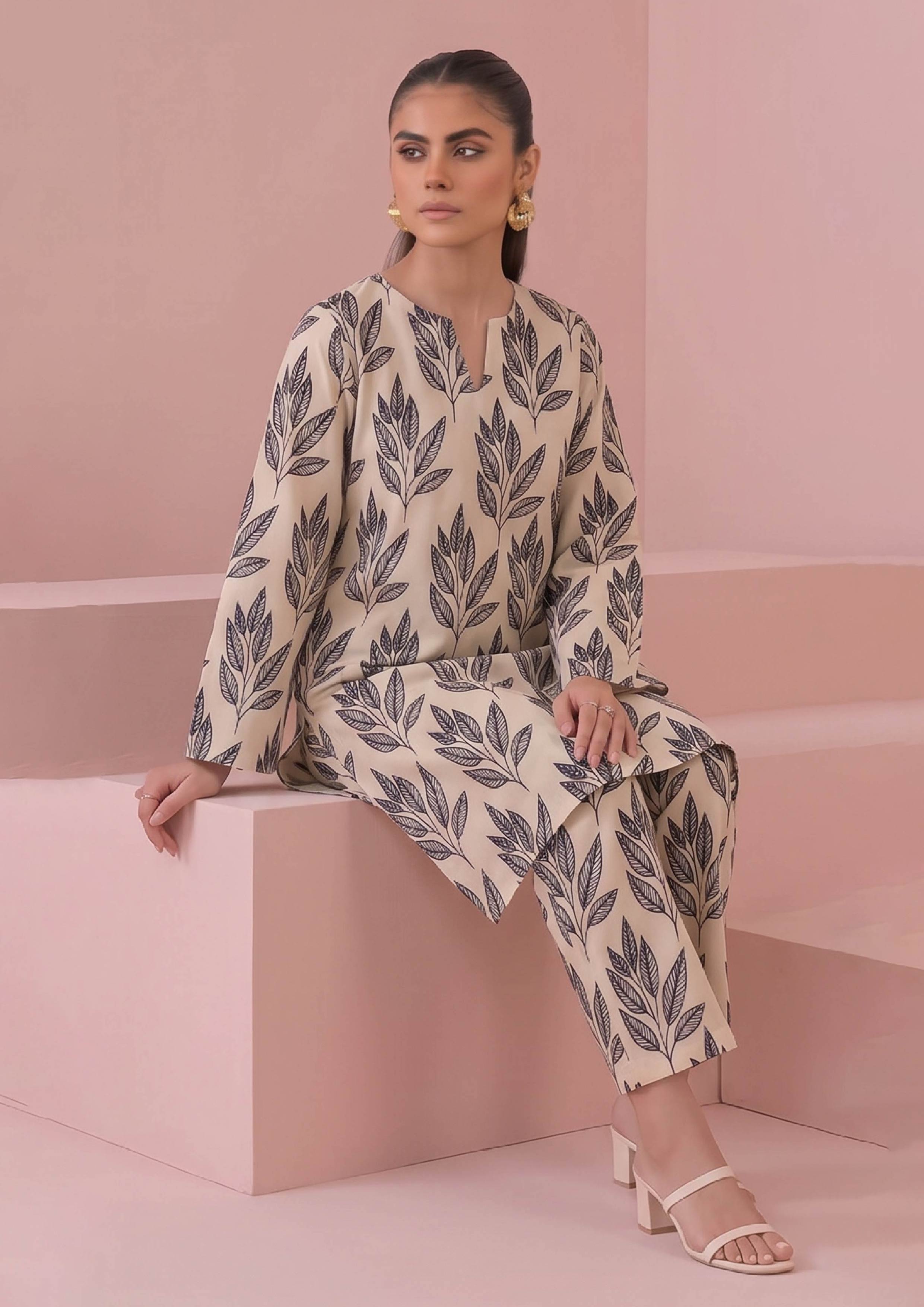 Side view of Botanical Foliage Noir casual 2 piece coard suit by Mirasl with long ivory printed shirt and matching trousers
