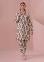 Front view of Botanical Foliage Noir ivory printed lawn suit with black leaf spray design, V notch neckline and matching trousers