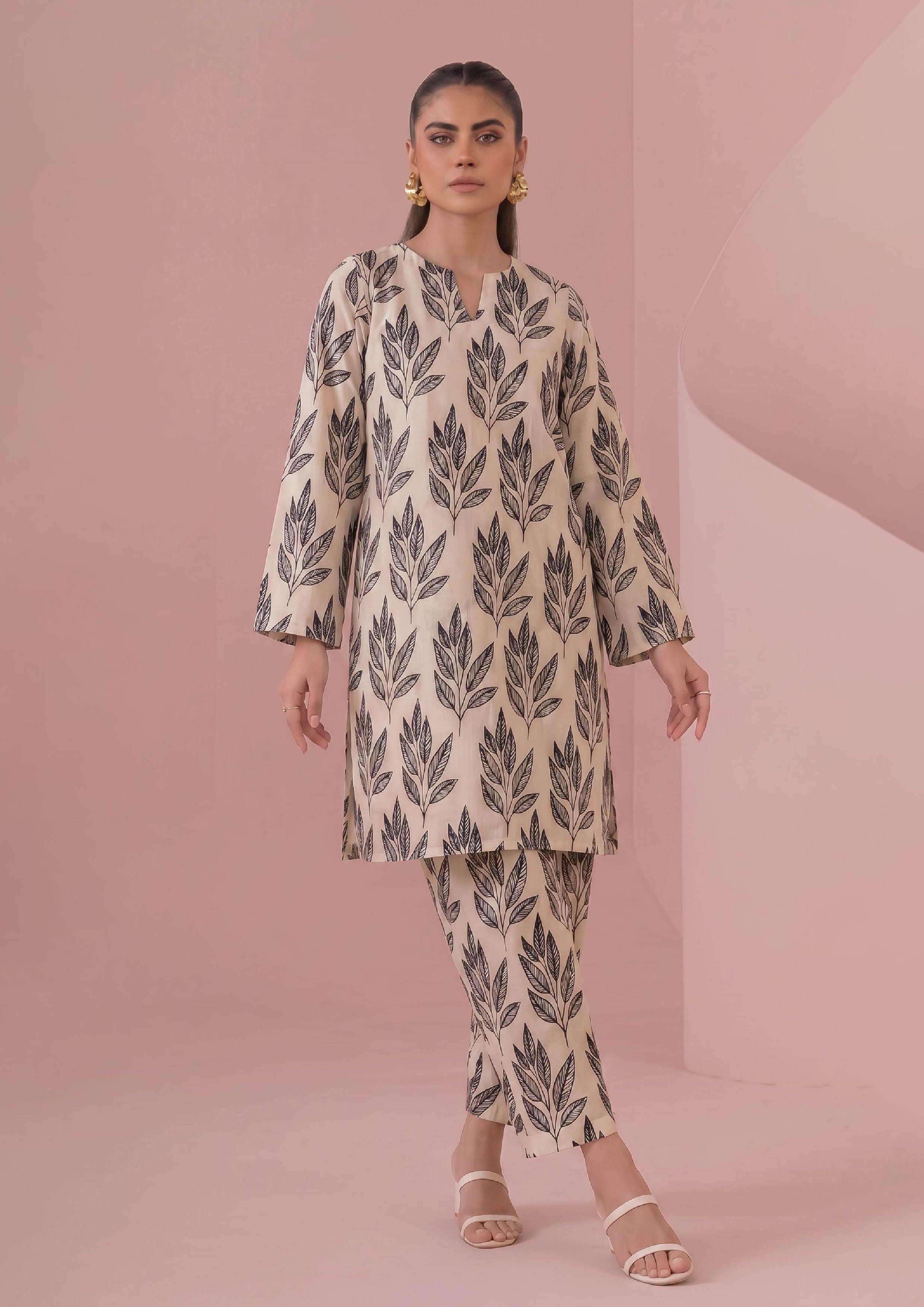 Full look of Botanical Foliage Noir ready to wear 2 piece coard suit with ivory botanical print shirt and straight-leg trousers