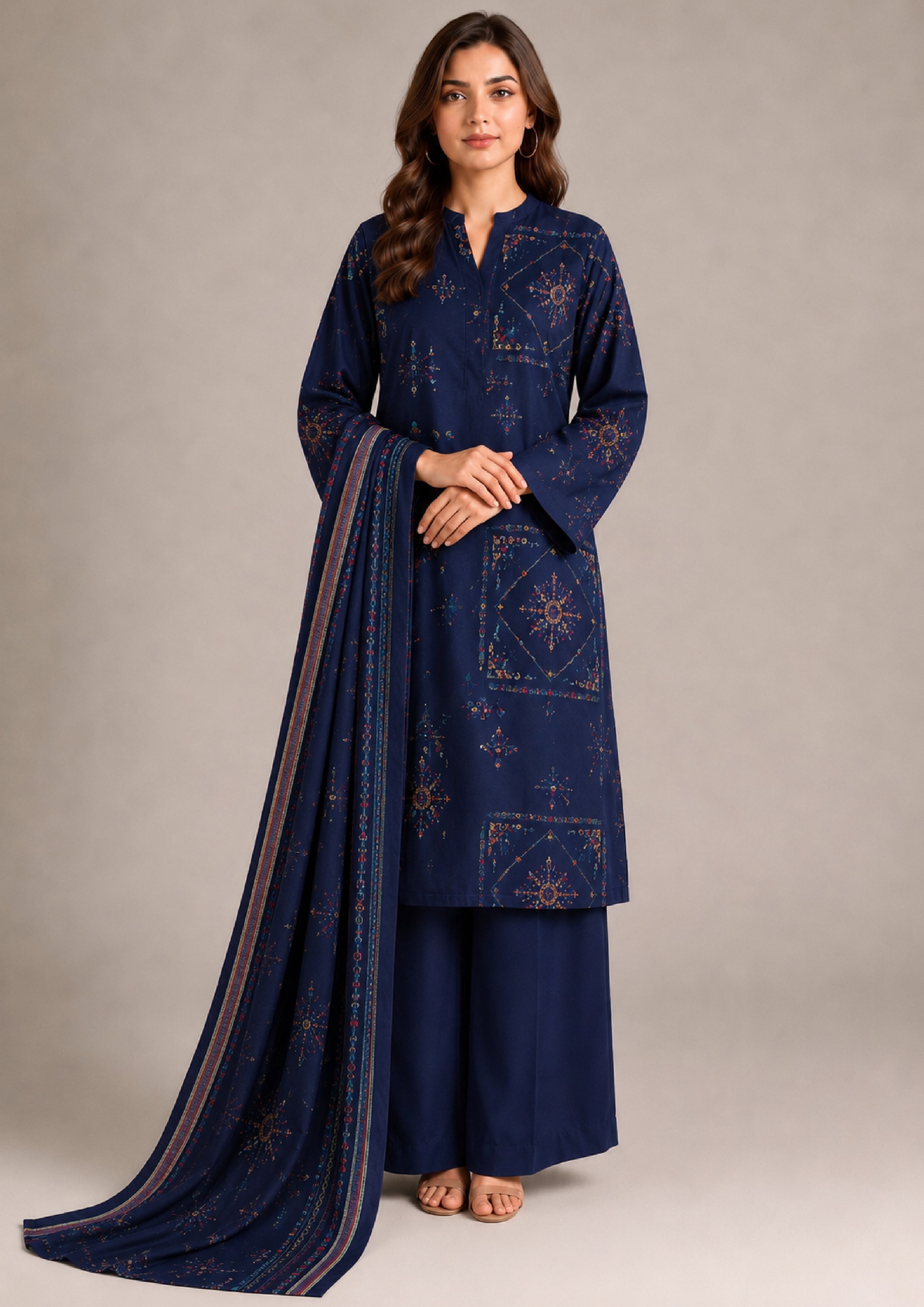 Deep navy blue printed lawn suit with matching bordered dupatta, front pose holding dupatta, geometric floral print and wide-leg trousers from Mirasl Fasl-e-Rang collection