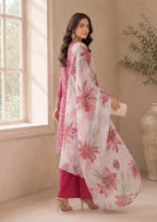 Rear three-quarter view of a rose pink embroidered lawn suit with a white floral printed dupatta and dark pink palazzo pants, showcasing elegant summer styling – fasl-e-rang – mirasl