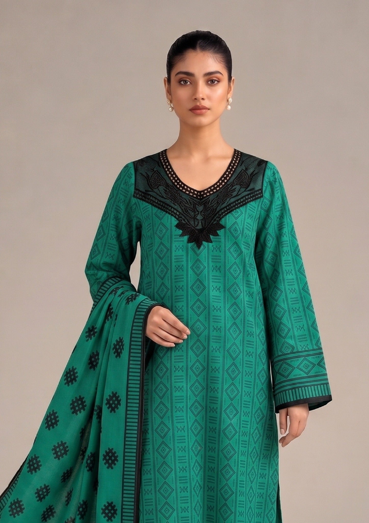 Seated view of Emerald Geo 3 Piece Stitched Lawn Suit in breathable Printed Lawn from the fasl-e-rang collection by Mirasl.