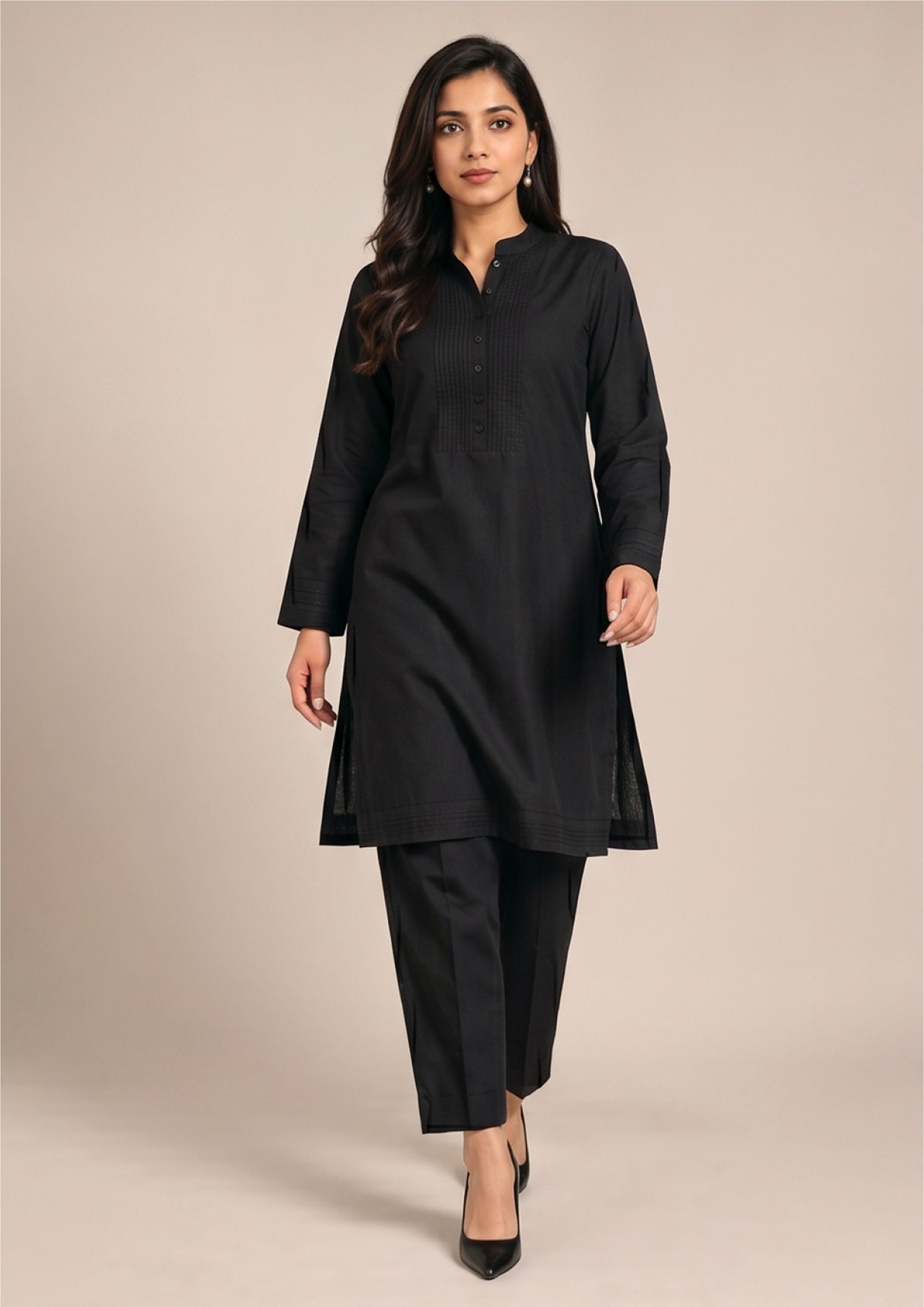 Front full look of Essential Pintuck Noir plain black coard suit with tonal stitched cuffs, side slits and matching trouser