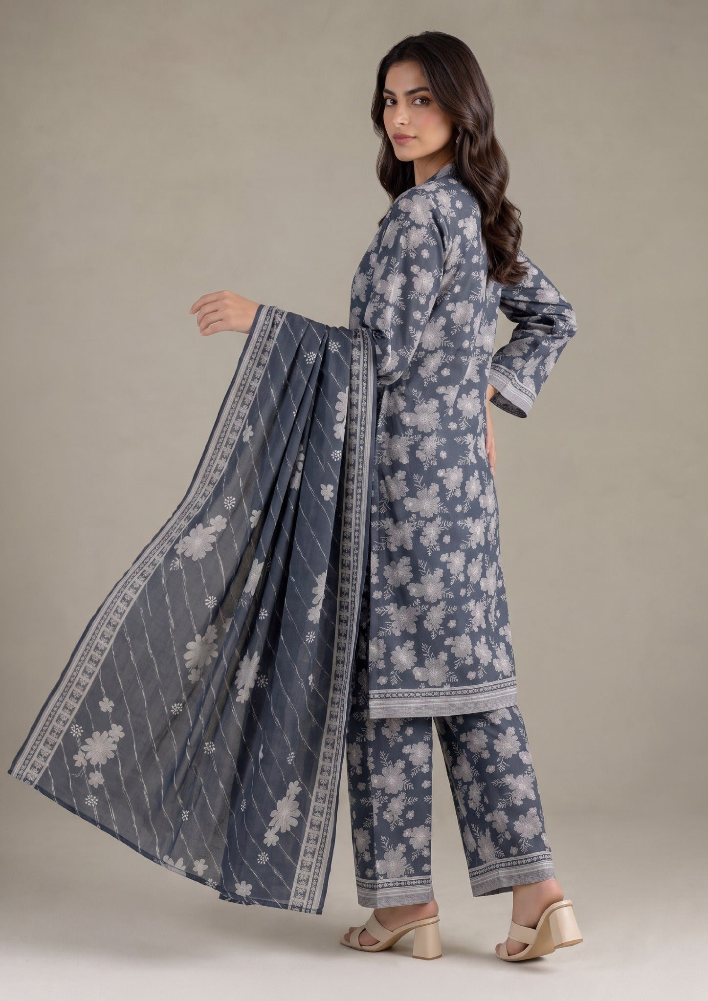 Front standing view of Ethereal Shadow 3 Piece Stitched Lawn Suit from the fasl-e-rang collection by Mirasl featuring coordinated floral prints.