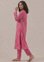 Side view of Mirasl Fuchsia Mandala co-ord set showing pink printed shirt, relaxed fit, and side slit.