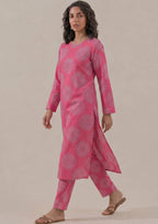 Walking view of Mirasl Fuchsia Mandala co-ord set featuring fuchsia pink print and relaxed straight fit.