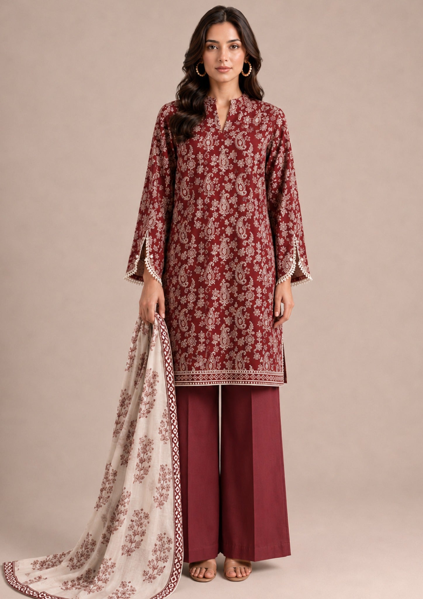 Heirloom 3 Piece Stitched Lawn Suit from the fasl-e-rang collection featuring a maroon printed cambric lawn shirt, printed dupatta, and dyed wide-leg trousers by Mirasl.