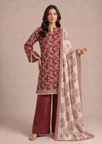 Front pose of Heirloom Pakistani printed cambric lawn suit with matching printed dupatta and wide-leg trousers by Mirasl.