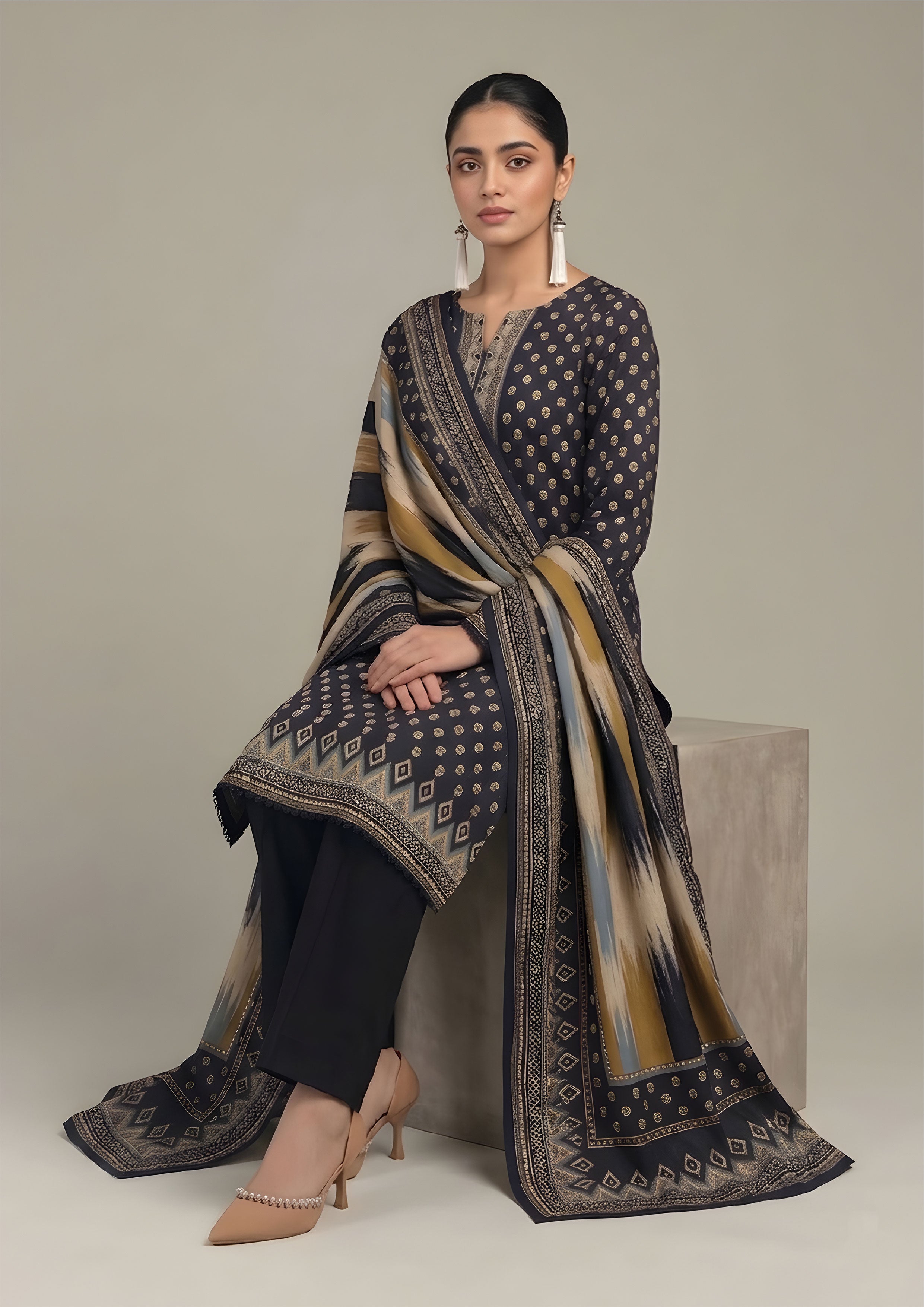 Back view of Ikat Fusion Noir women stitched lawn suit showing large ikat-inspired dupatta with mustard, blue and geometric borders