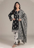 Inverted Ivory Noir Pakistani lawn suit with black kurta, ivory printed trouser and bold scrollwork dupatta