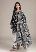Front view of Inverted Ivory Noir black and ivory 3 piece stitched lawn suit with lace hem, printed trouser and statement dupatta