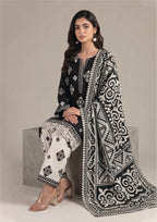 Back view of Inverted Ivory Noir black and white lawn suit with oversized printed dupatta and ivory trouser details
