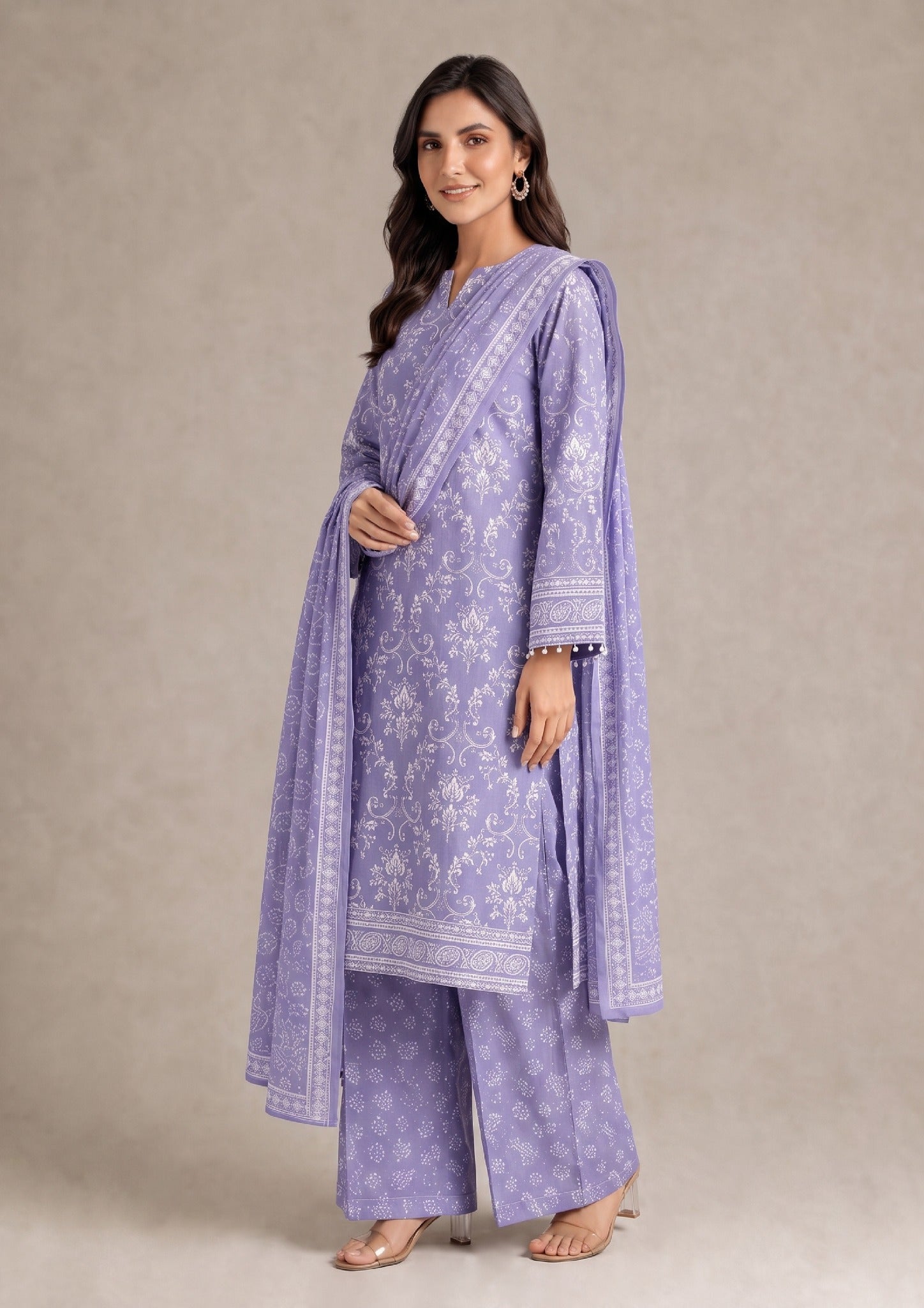 Elegant portrait view of Lavender Heirloom printed lawn suit highlighting the coordinated dupatta, sleeve borders and premium printed fabric.