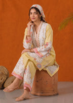 Lemon Fleur printed lawn SHIRT and matching BOTTOM with floral panels and pink borders, seated view