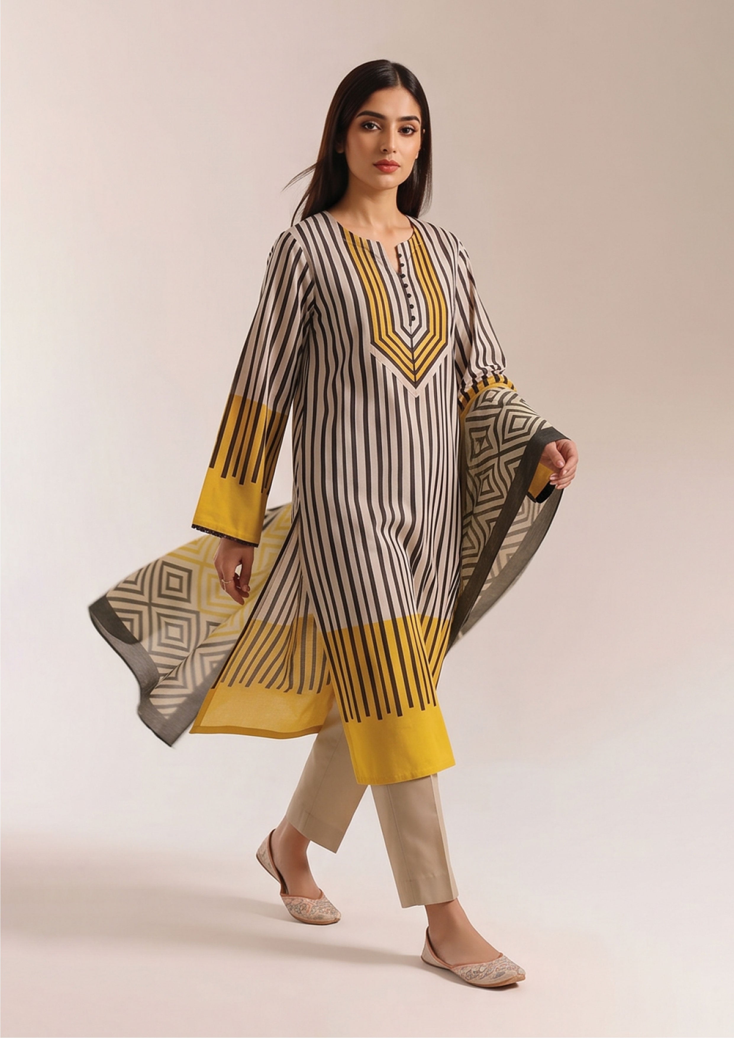 Full look of Linear Sunshine Noir black and ivory lawn suit with sunshine yellow accents, beige trouser and geometric diamond dupatta