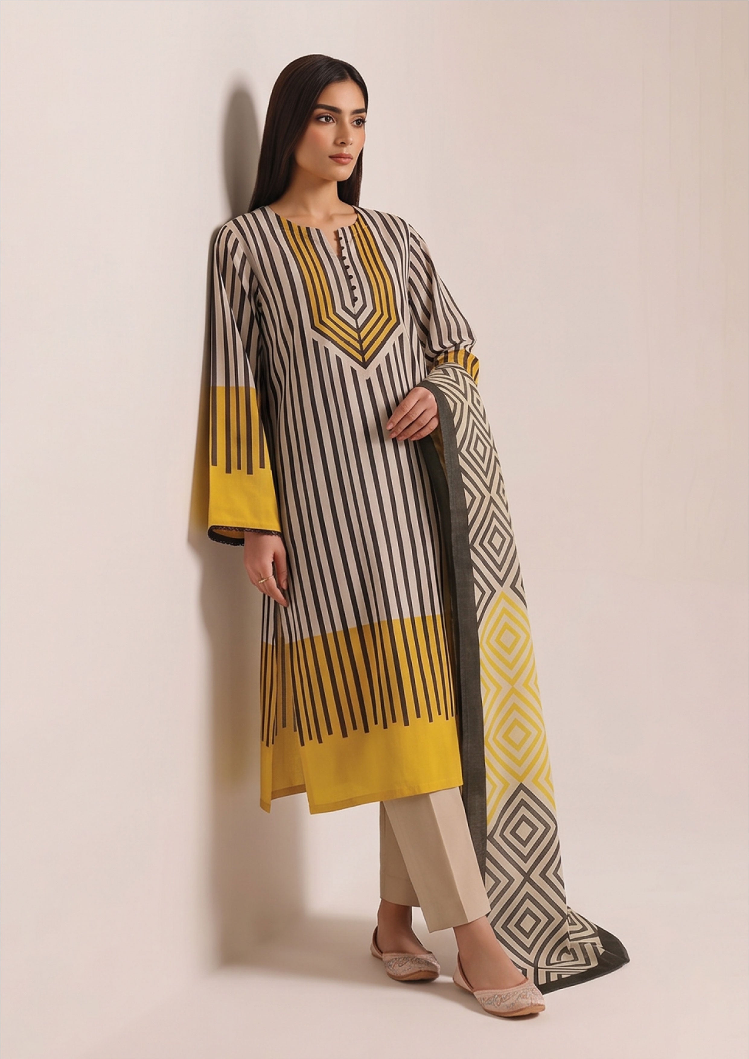 Linear Sunshine Noir Pakistani lawn suit with pinstripe kurta, beige trouser and statement diamond-print dupatta in yellow grey and black