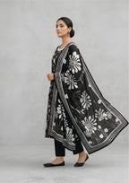 Side view of Midnight Bloom ready to wear black lawn suit with bold floral dupatta and geometric border