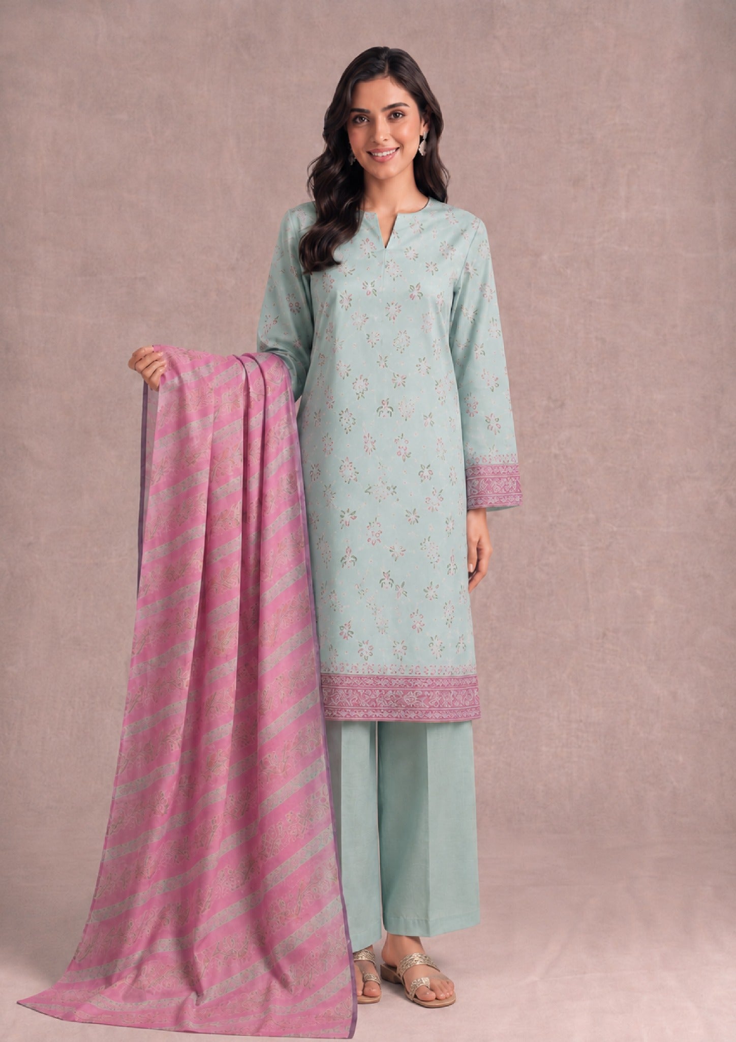 Mint Grace 3 Piece Stitched Lawn Suit from the fasl-e-rang collection featuring a mint green Printed Cambric Lawn shirt, pink printed dupatta, and dyed wide-leg trousers by Mirasl.