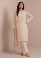 Elegant Ivory Pearl ready-to-wear embroidered suit showcasing embroidered details