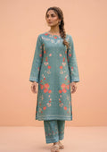 Model wearing Mirasl Spring Marine, a 2 piece stitched co-ord set featuring a marine green floral printed kurti with matching printed trousers